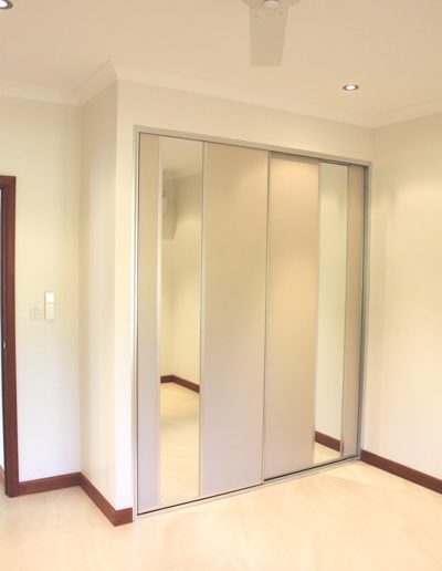 Wardrobe Bedroom Sliding Doors with Taupe panels and vertical mirrors