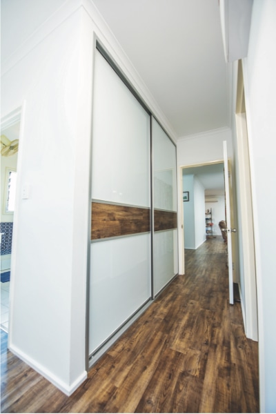 Laminate Flooring Feature in Hallway Cupboard
