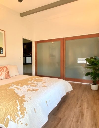 Bedroom Sliding Doors Frames with Queensland Pencil Timber. Panel is Translucent Glass