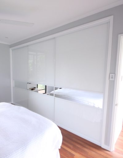 White Glass Closet Doors with Feature Mirror Panel