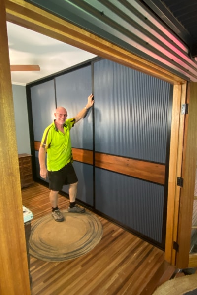 Carl showing a finished Built In Wardrobe