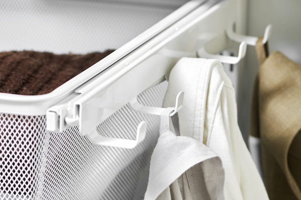 elfa pull out mesh drawer with hooks on the side for bags, jackets etc