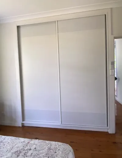 White Sliding Doors with powder coated white mesh panels for airflow