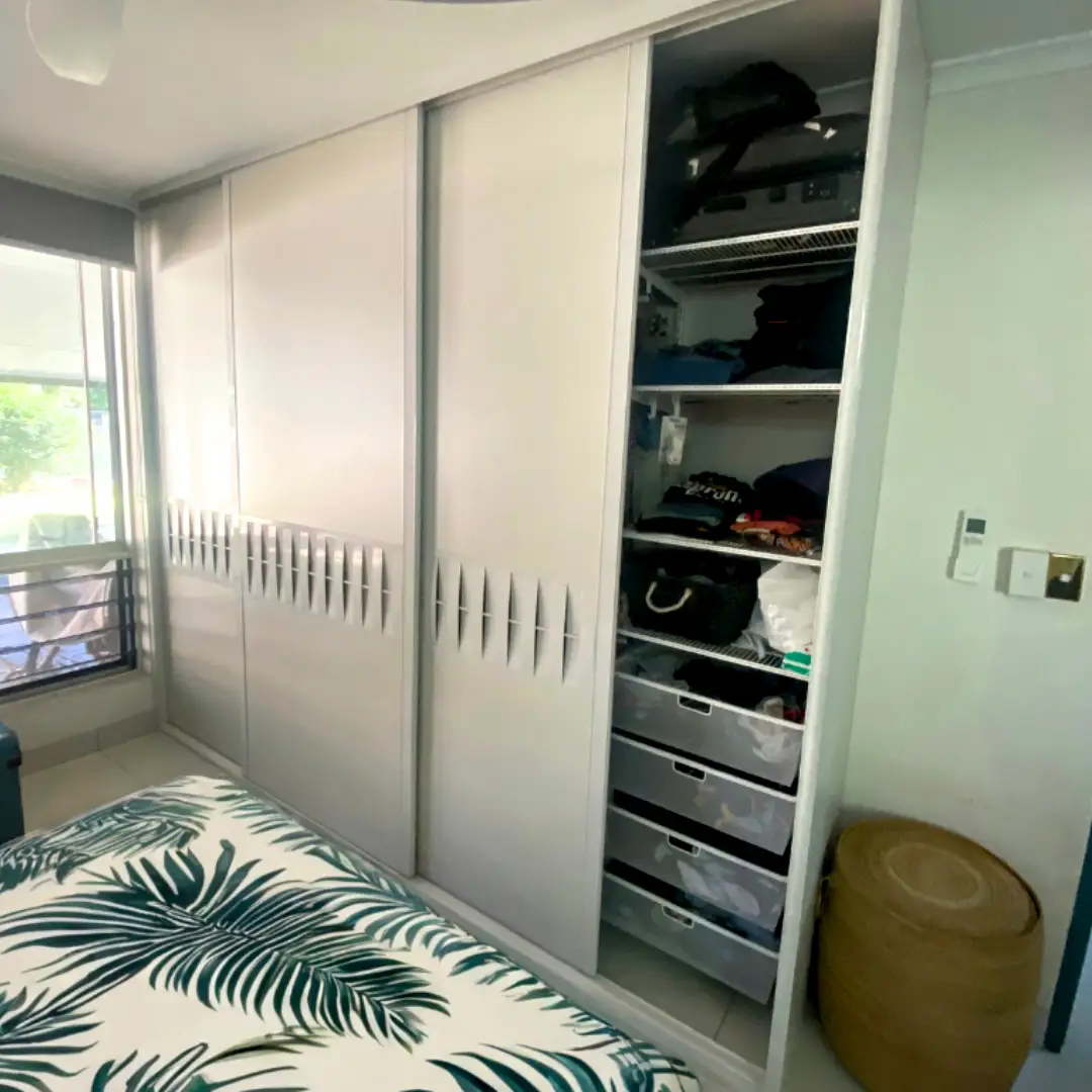 Territory Designed Storage Solution.  White Louvre Sliding doors elfa shelving