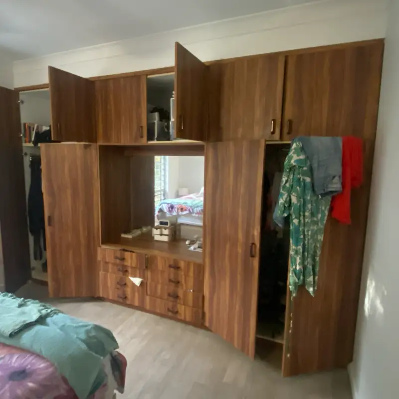 Darwin Wardrobe presented with problems of doors and drawers not opening and closing properly and musty clothes smell