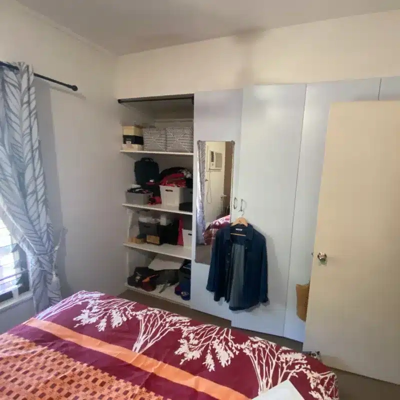 After Image: The same bedroom with new modern sliding doors